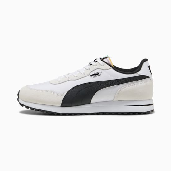 White PUMA trainer, adult size, with black stripe and Helsinki branding.