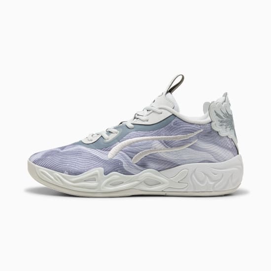 Grey PUMA trainer with wavy pattern, white sole, and decorative wing detail.