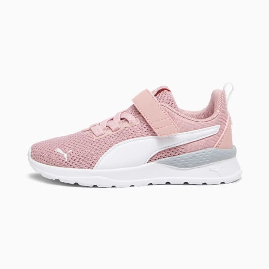 Pink PUMA trainer for kids with a touch-fastening strap and white formstrip.
