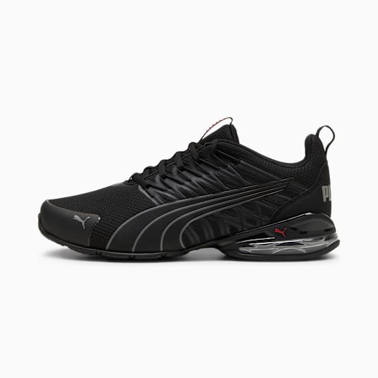 Black PUMA men's trainer with mesh upper and cushioned sole for enhanced comfort.