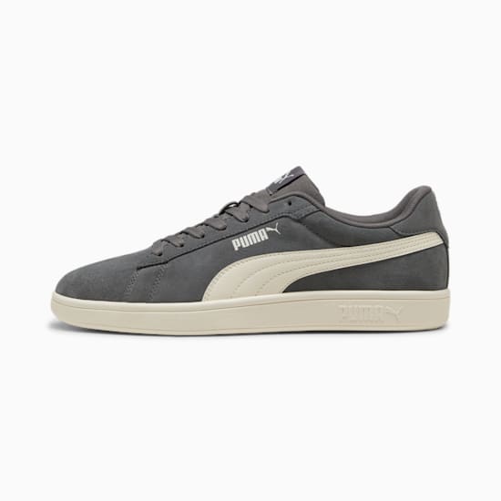 Grey PUMA trainer, adult, with a suede upper and off-white formstrip and sole.