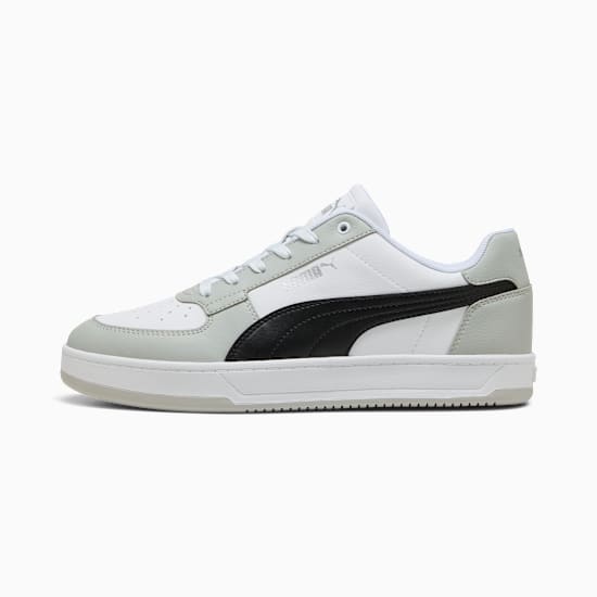 White PUMA trainer with a black side stripe and light grey accents for adults.
