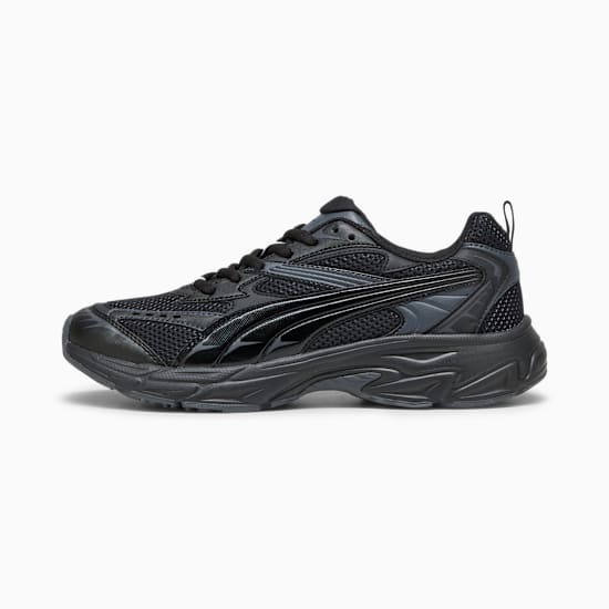 Black PUMA trainer with mesh details and a wavy sole for adults.