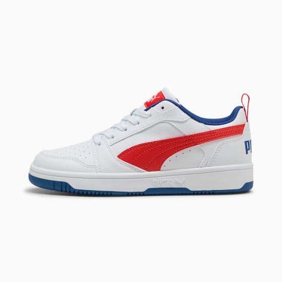 White PUMA trainer for youth with a red stripe and blue trim detailing.