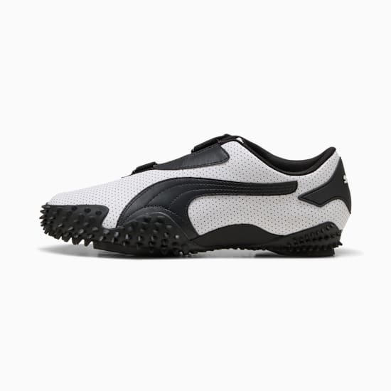 White PUMA women's shoe with black accents and a textured, studded sole.