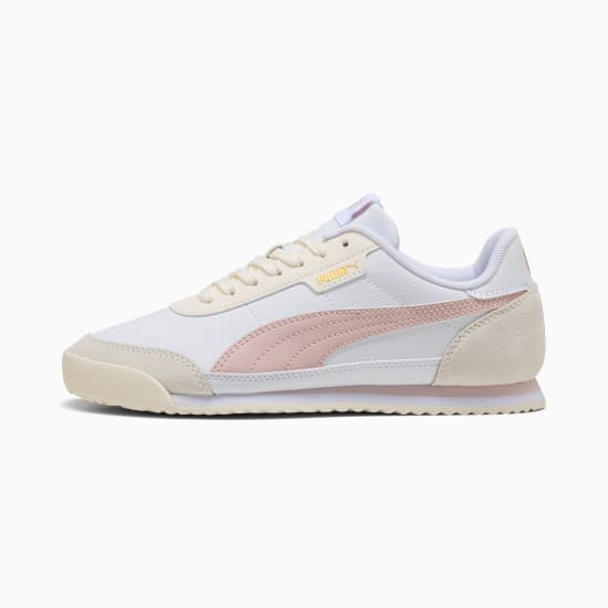 White PUMA trainer for women with a pink stripe and lace-up fastening.