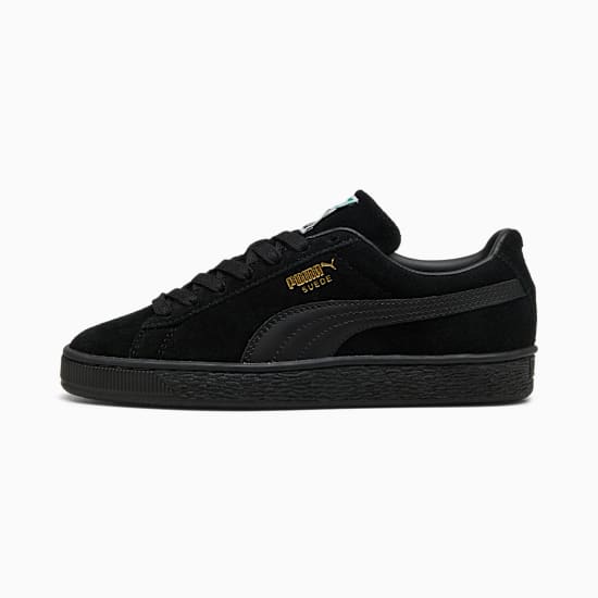 Basket unisexe PUMA Suede noire avec fermeture à lacets et semelle en caoutchouc.
