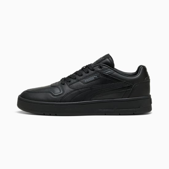 Black PUMA trainer with tonal stitching and a low-profile rubber sole.