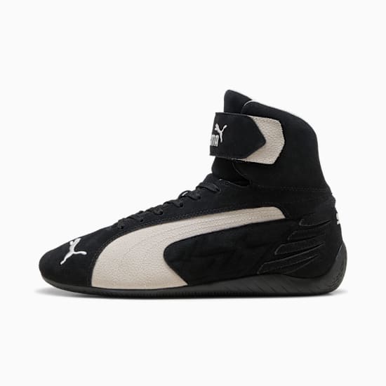 Black PUMA motorsport shoe with a high top, strap and off-white side stripe.