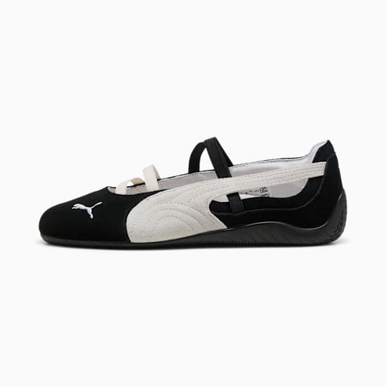 Black PUMA ballet flat for women with white formstripes and crossing straps.
