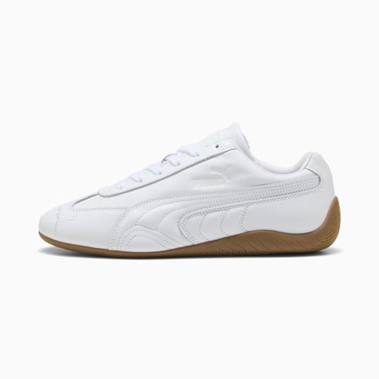 White PUMA men's sneaker with side stripe and brown rubber sole.