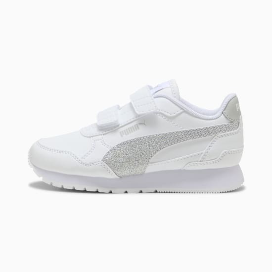 White PUMA trainer for children with glittery side stripe and two fastening straps.