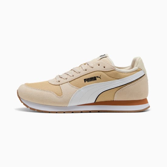 Beige PUMA trainers for adults, featuring a white side stripe and lace-up fastening.