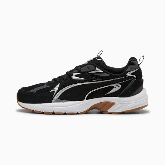 Black PUMA trainer, adult size, with silver stripes and white/brown sole.