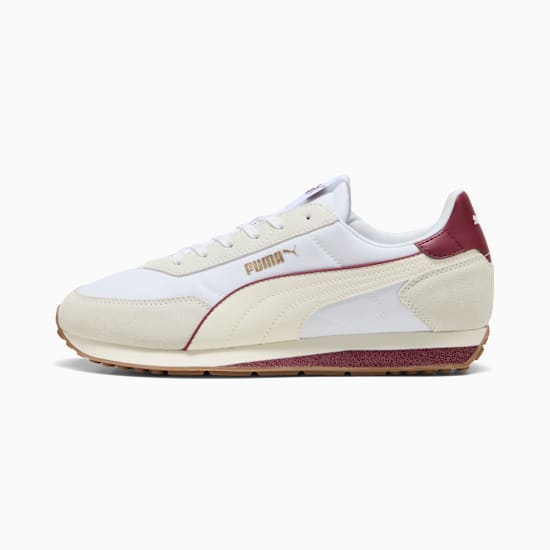 White PUMA trainer with suede accents and a dark red heel and sole trim.