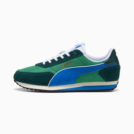 Groene PUMA sneaker voor volwassenen, met blauwe streep en witte veters.