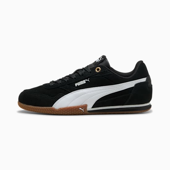 Black PUMA trainer with white stripe and brown textured sole for adults.