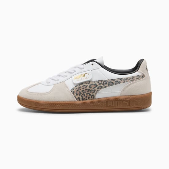 White PUMA trainer with leopard print stripe and brown sole for adults.