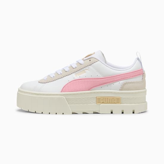 White PUMA trainer, women's, with a pink stripe and chunky beige sole.