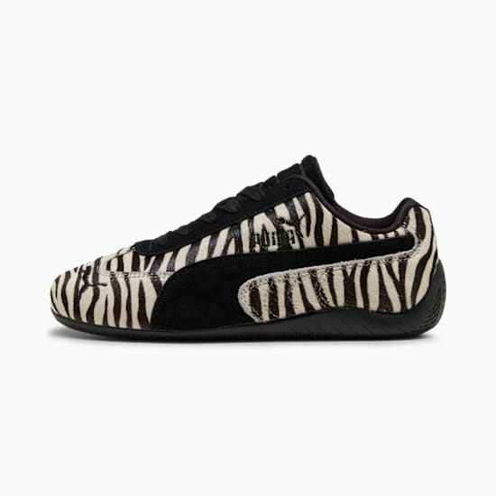 Zebra PUMA sneaker with black suede details and a low profile for adults.