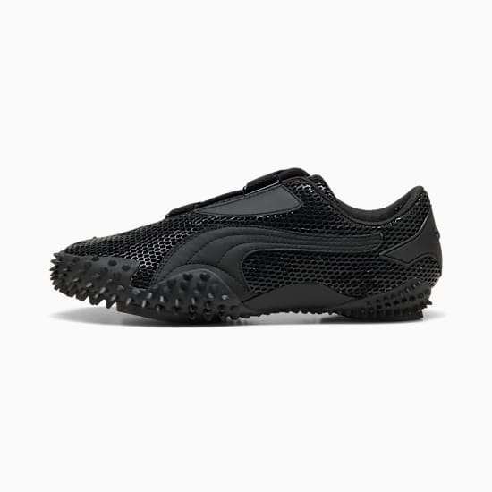 Black PUMA trainers, child's shoe, with a mesh upper and studded sole detail.