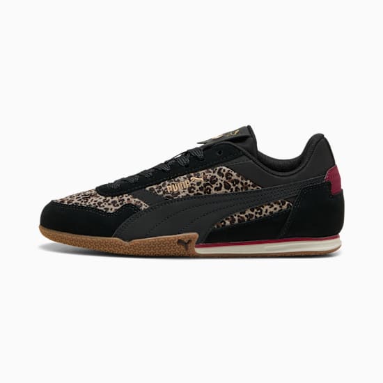 Black PUMA trainer with leopard print panels and a gum sole.