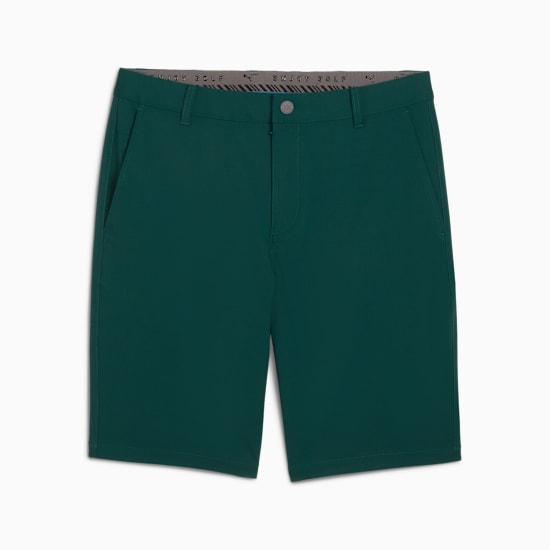 Green PUMA golf shorts for men, featuring a standard fit and side pockets.