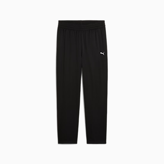Black PUMA woven trousers with elasticated waistband and logo detail for adults.