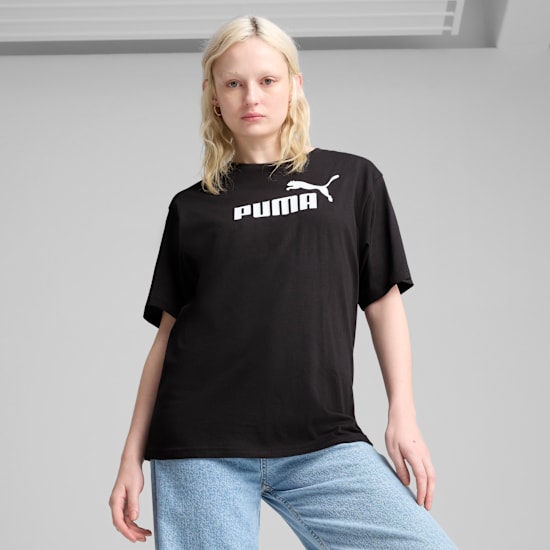 A model poses against a grey backdrop, wearing a black t-shirt with the PUMA logo.