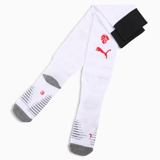 White PUMA socks featuring black ribbed cuffs and red logo details.