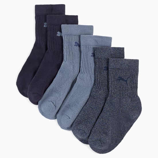 Black, blue and light blue PUMA adult socks with ribbed texture and logo.