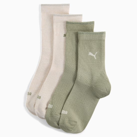 Beige and green PUMA socks for adults with logo detail.