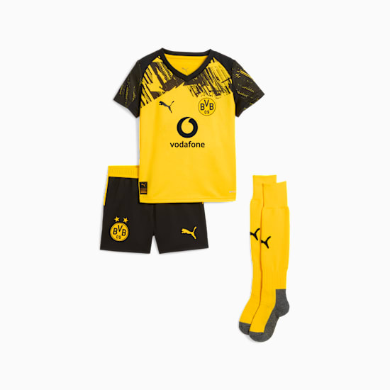 Yellow PUMA kit for youth, featuring a shirt, shorts, and socks with team and sponsor logos.