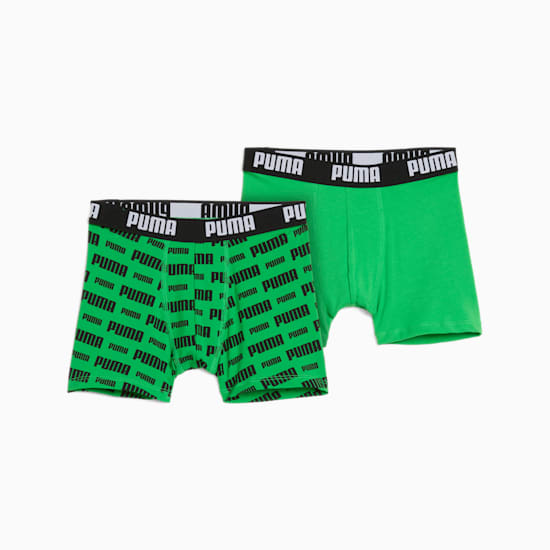 Green PUMA boy's trunks, one patterned with logos, the other plain.