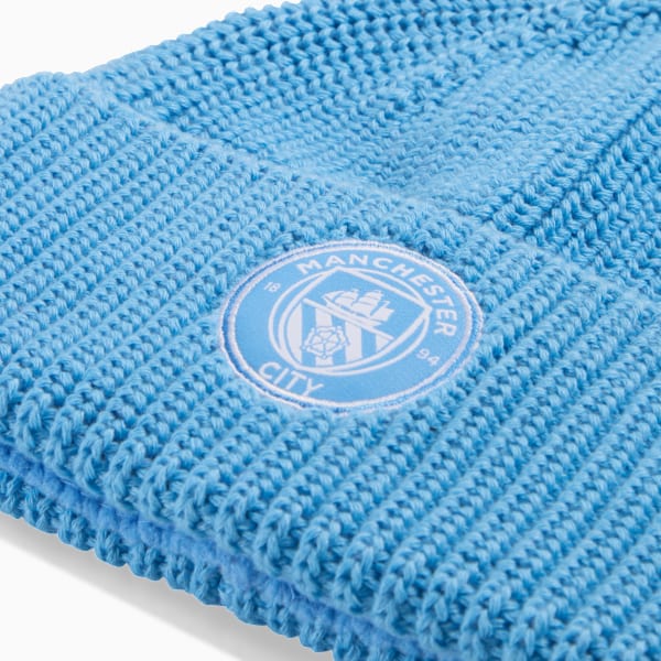 Blue PUMA beanie adult with Manchester City badge detail.
