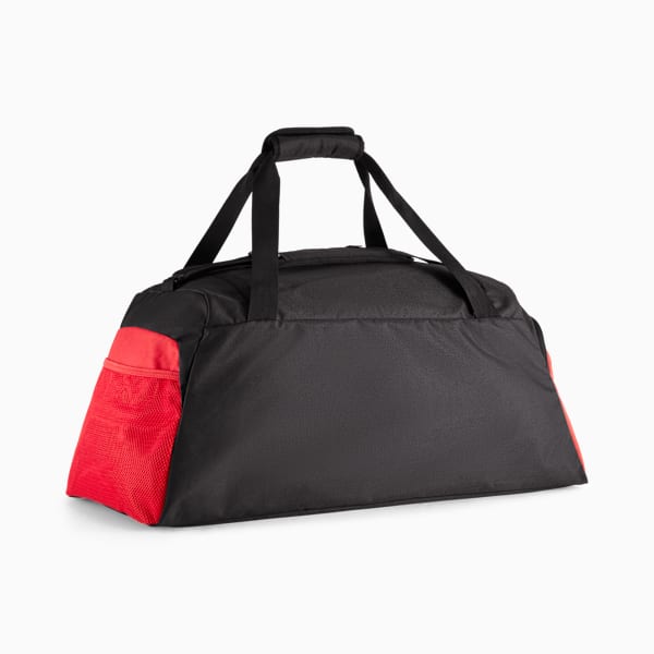 Black PUMA holdall with red mesh side pocket and dual carry straps.