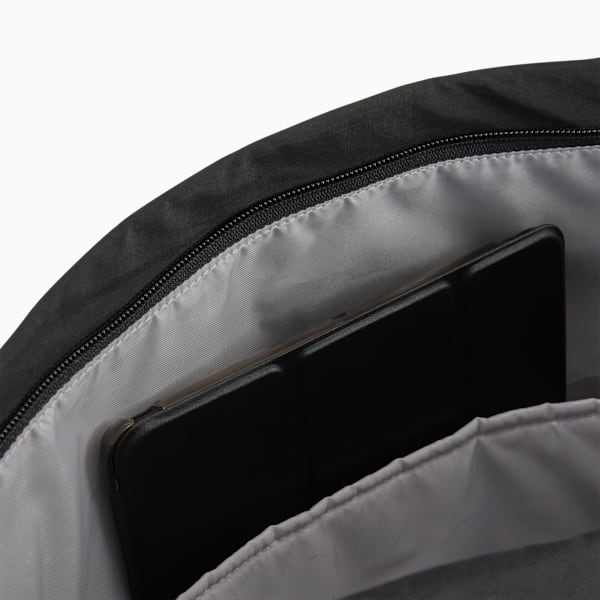 Black PUMA unisex bag showing inside with padded compartment and zipper.