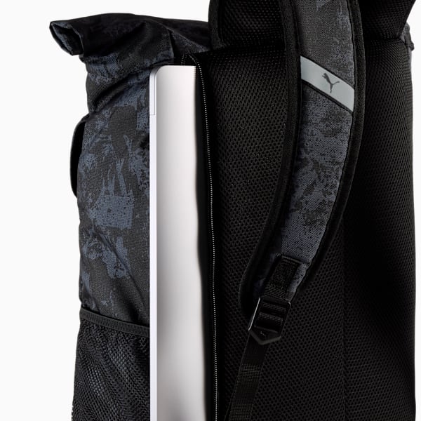 Black PUMA unisex backpack with patterned design and a laptop sleeve.