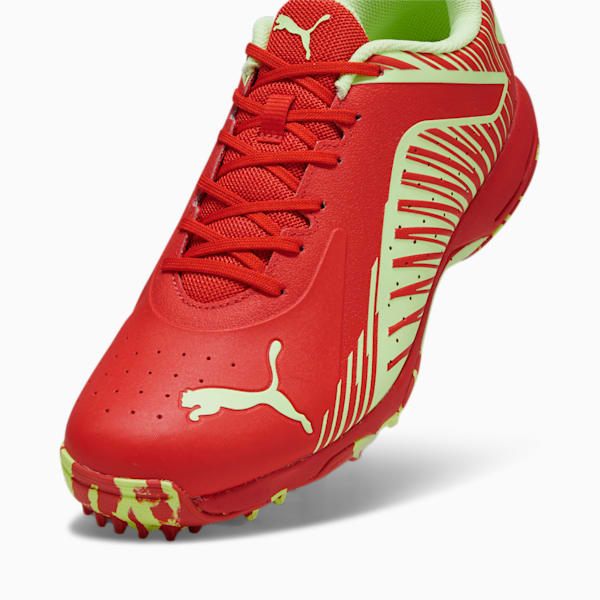 PUMA 22 FH Rubber Unisex Cricket Shoes, PUMA Red-Speed Green, extralarge-IND