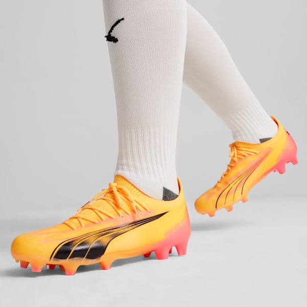 Tacos de fútbol para mujer ULTRA ULTIMATE FG/AG, Sun Stream-PUMA Black-Sunset Glow, extralarge