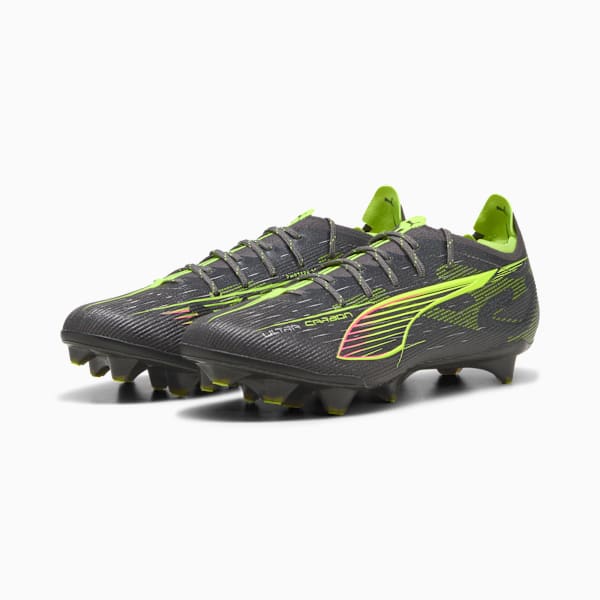 Grey PUMA football boots with neon green accents and a low-cut design.
