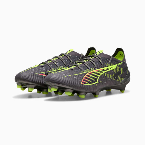 Grey PUMA football boots with neon green accents and a textured upper for adults.