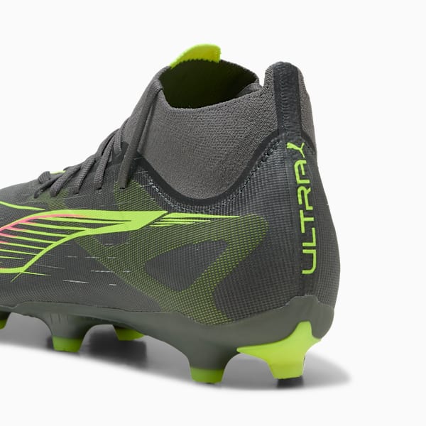 Grey PUMA football boot featuring neon green accents and the word 'ULTRA' on the heel.