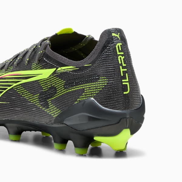 Grey PUMA football boot featuring neon green accents and the word ULTRA on the heel.