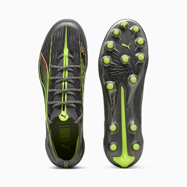 Black PUMA football boots with neon green accents and lace-up closure.