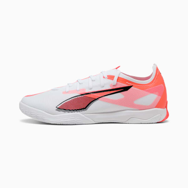 White PUMA indoor shoe with coral details and a black formstrip for adults.