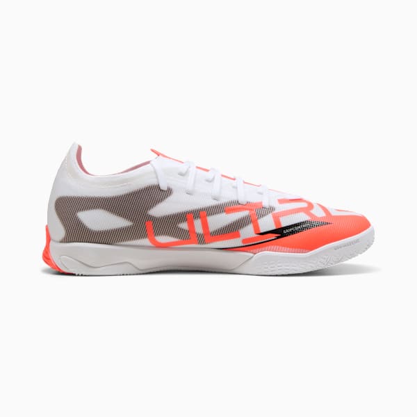 White PUMA indoor shoes for adults, featuring a coral logo and lace-up closure.
