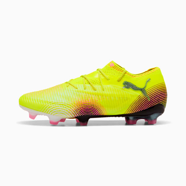 Yellow PUMA football boot featuring pink accents and a textured upper.