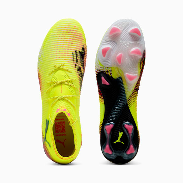 Yellow PUMA football boots with laces, showing the sole with pink and black details.