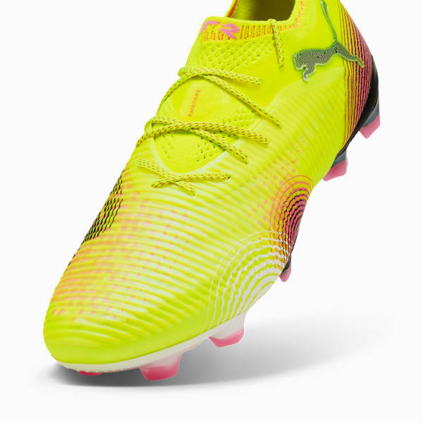 Yellow PUMA football boot, adult size, with textured upper and pink accents.